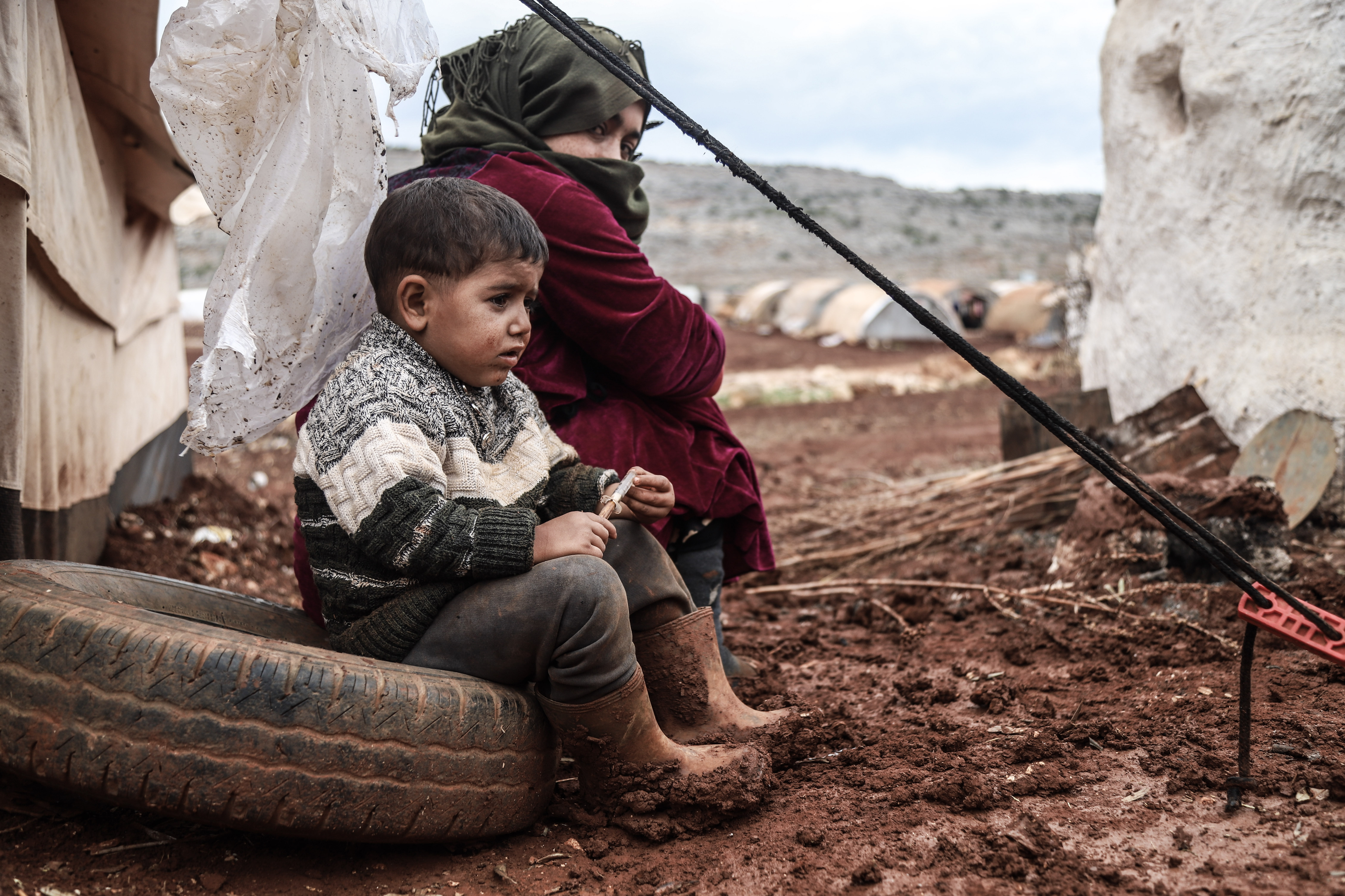 Orphaned children in need of food and clean water